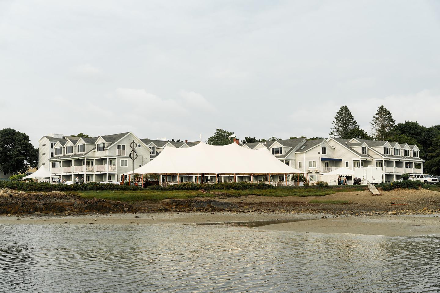 A sailcloth tent on the rivers edge