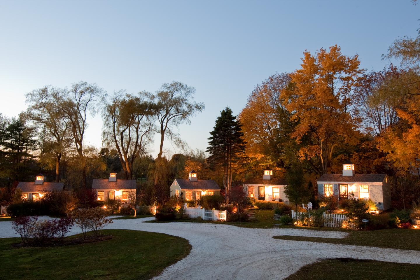 Exterior of The Cottages at Cabot Cove at night