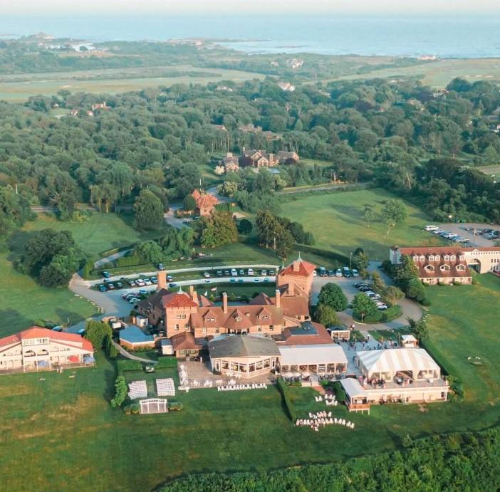 Aerial view of a large estate with gardens and historic buildings.