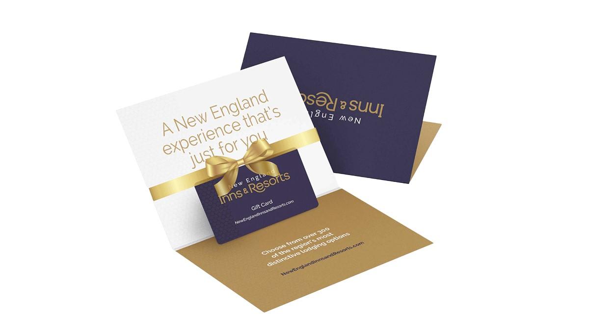 Elegant gift card with gold accents and navy envelope.