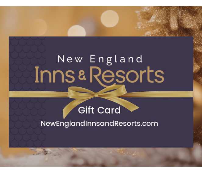 Gift card with gold ribbon on purple background, festive tree in background.