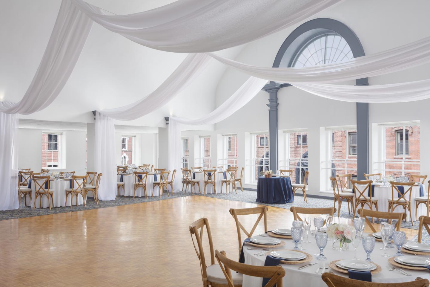 Elegant banquet hall with draped ceiling