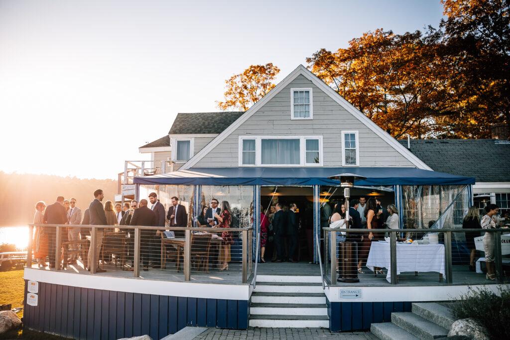 Sunset wedding at waterfront restaurant