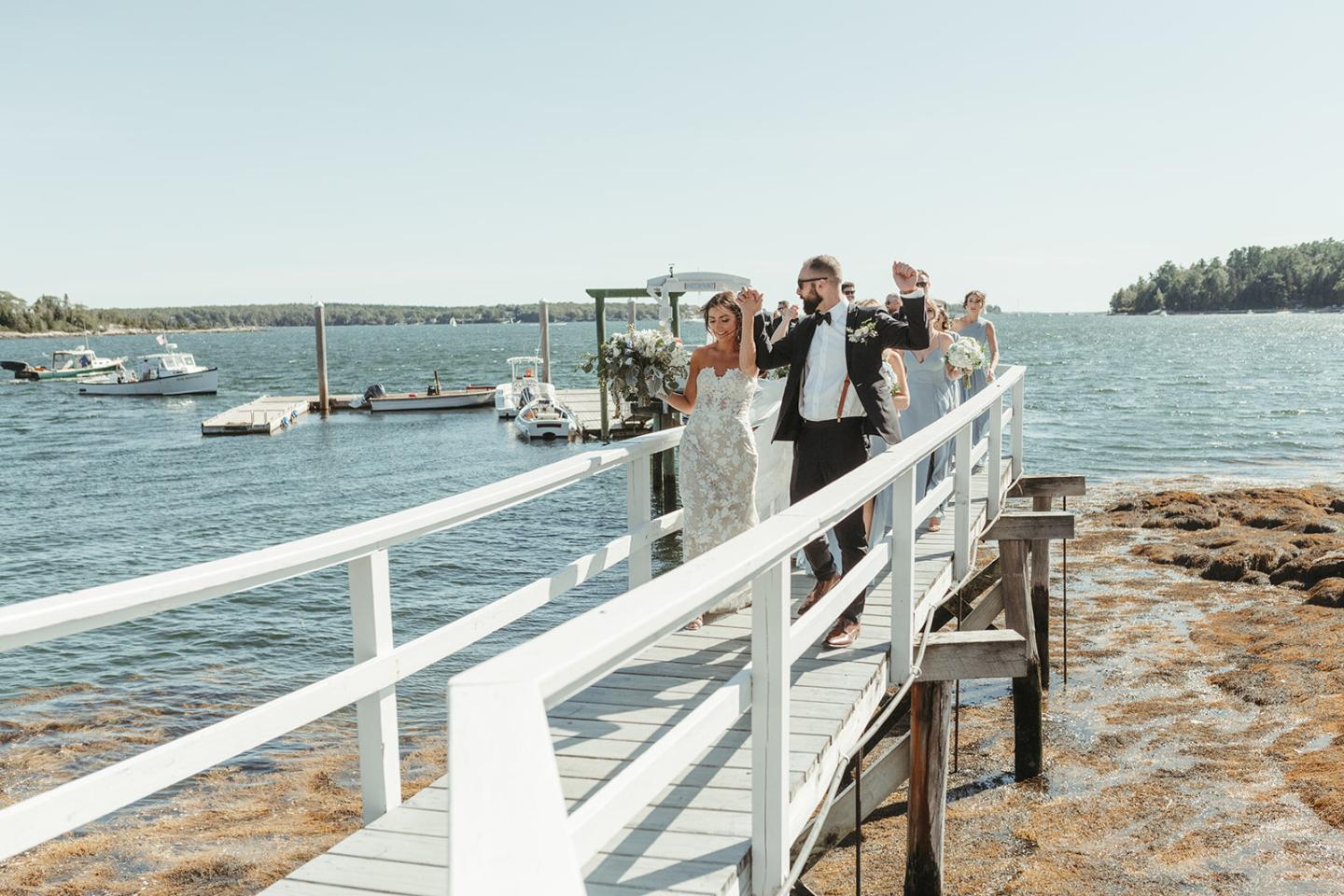 Bride and groom on Linekin Bay Resort dock