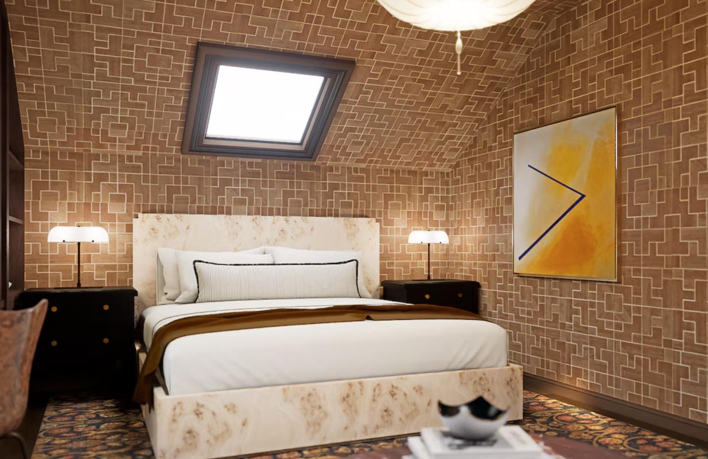 Cozy bedroom with skylight, patterned walls, and abstract art.