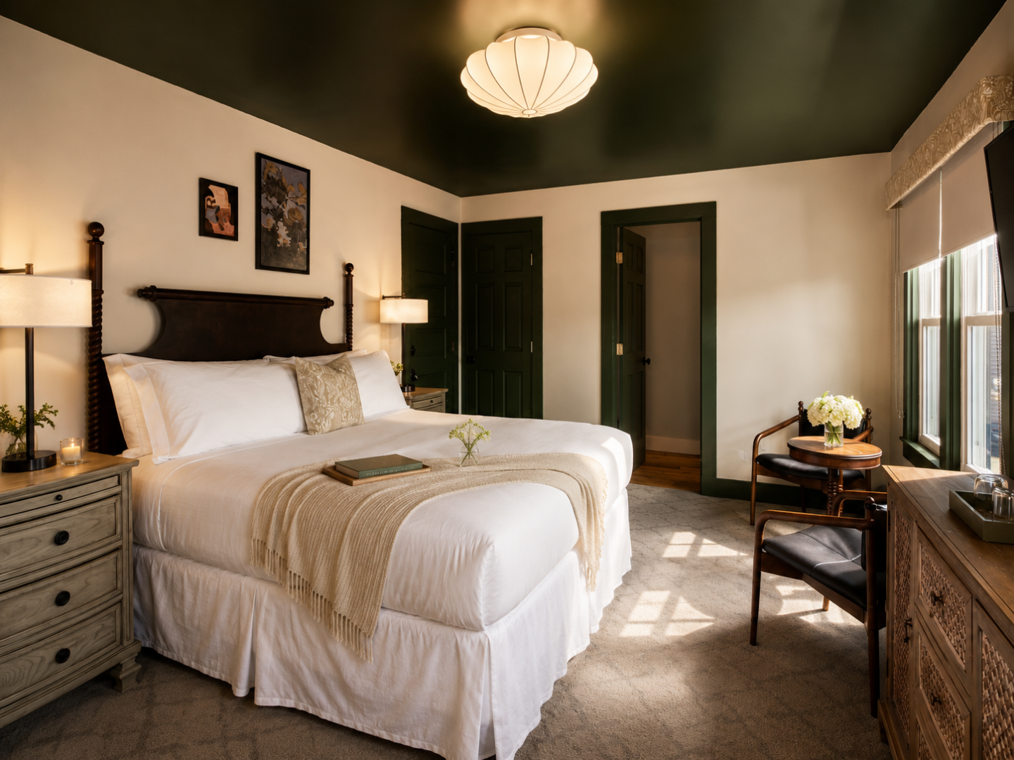 Cozy bedroom with a large bed, soft lighting, and elegant decor.