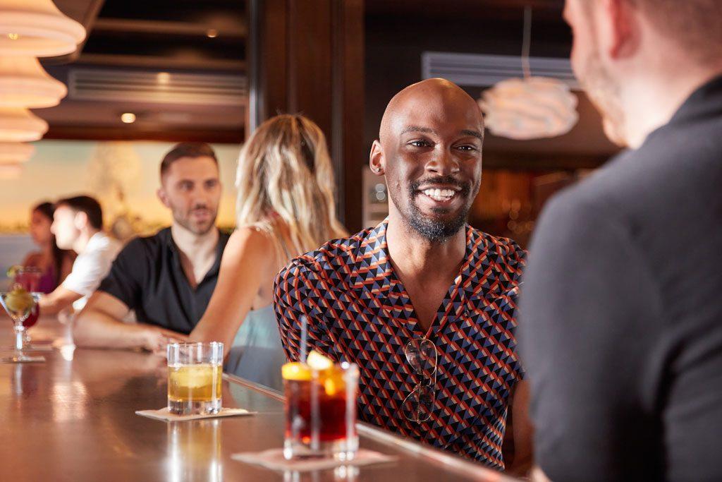Guests enjoying craft cocktails at the Choo Choo Lounge.