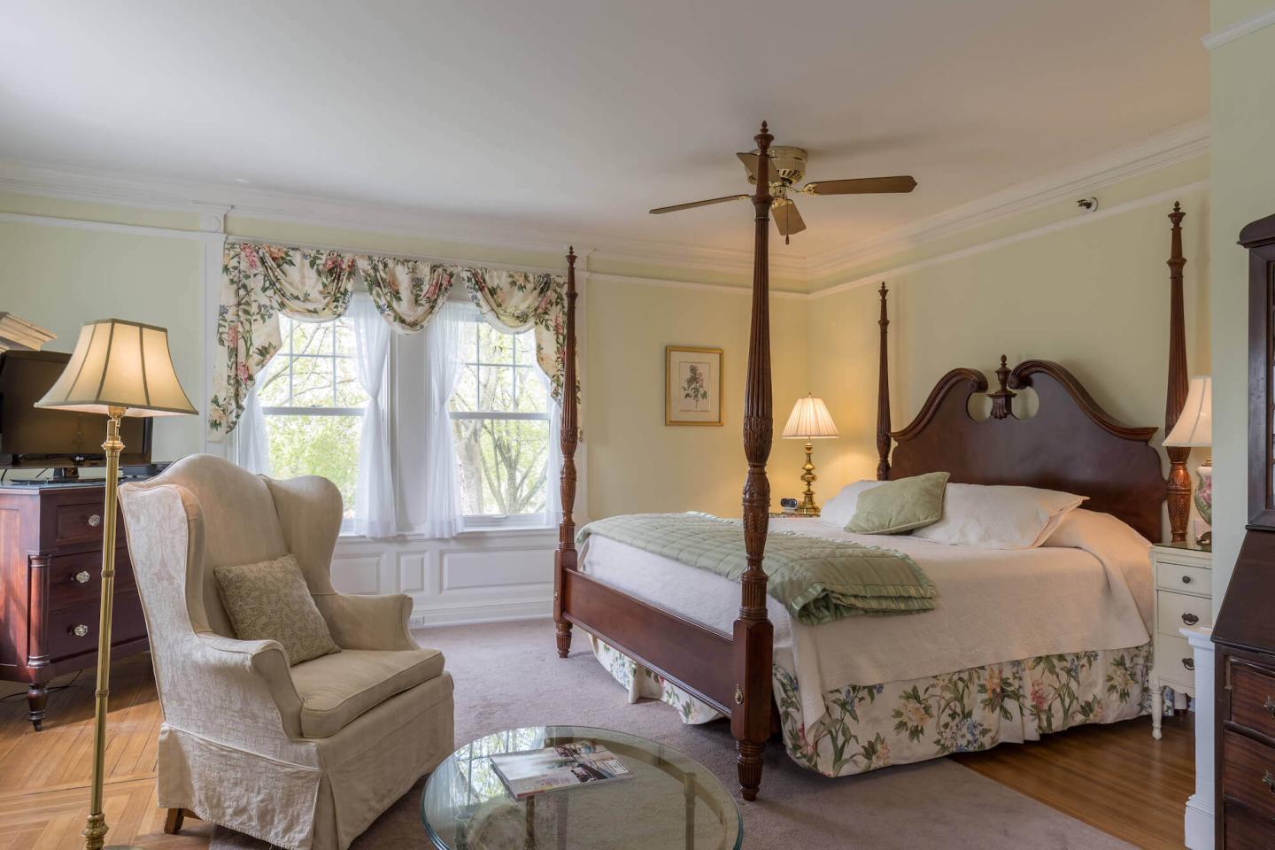 Brush Suite, a guest suite with a clawfoot tub and king bed, at Stanton House Inn
