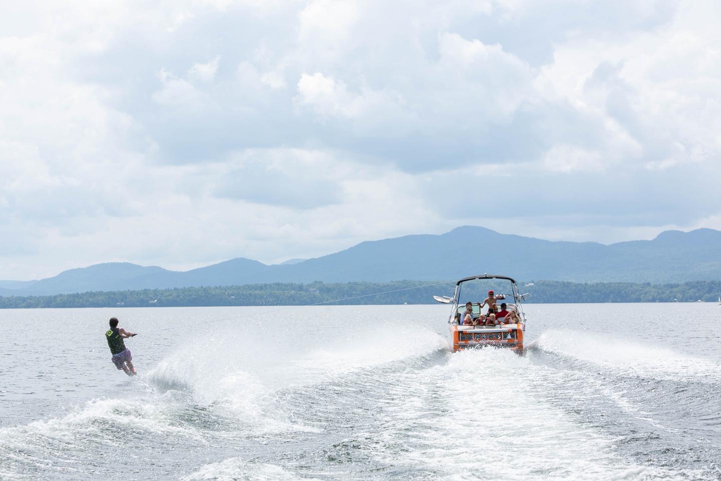 Boy water skiing behind Epic Boat