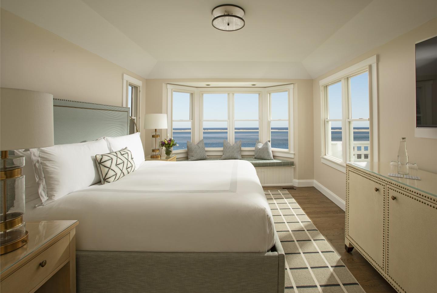 Bedroom of an oceanfront cottage suite