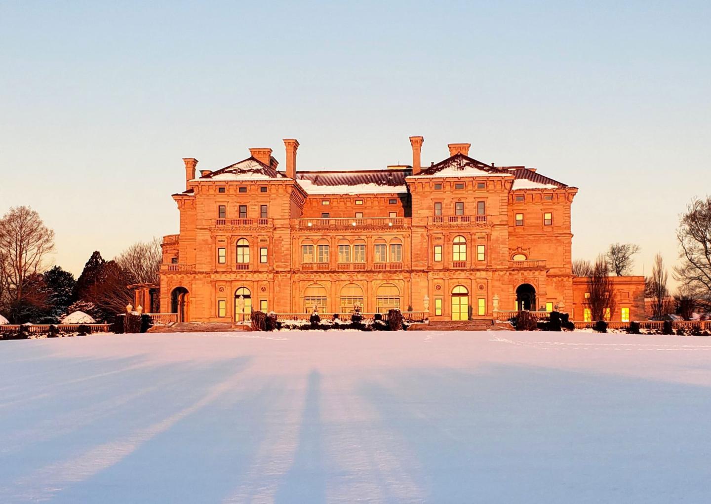 Exterior of large mansion in the winter