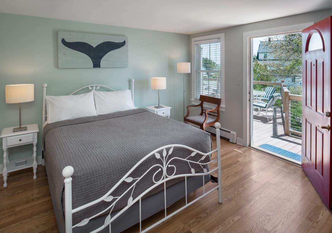 Queen bed in the Ash Island dog friendly room