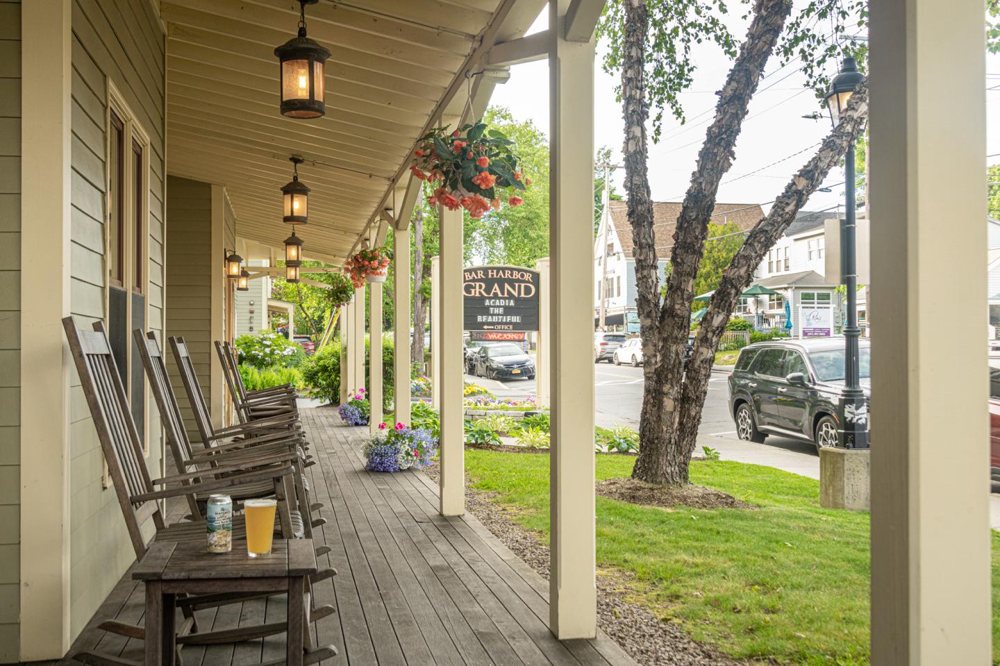 The Grand's front porch is lined with rocking chairs for guests to enjoy while experiencing the sights and sounds of downtown.