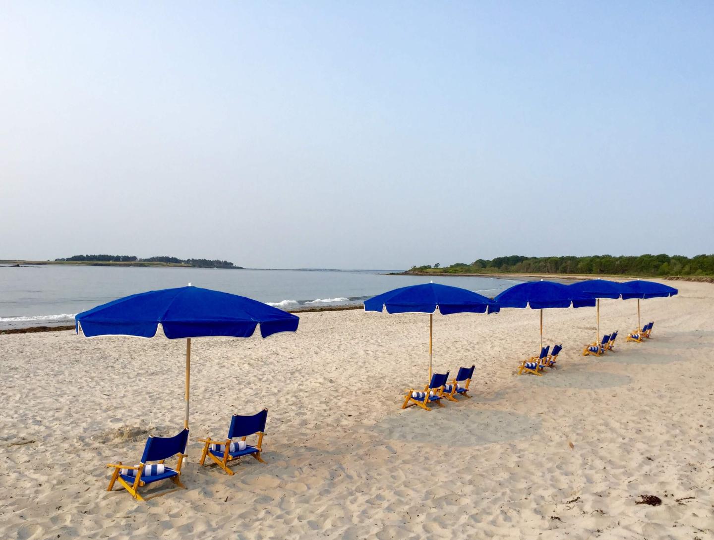 A private boardwalk leads to a mile of sand beach from Inn by the Sea 