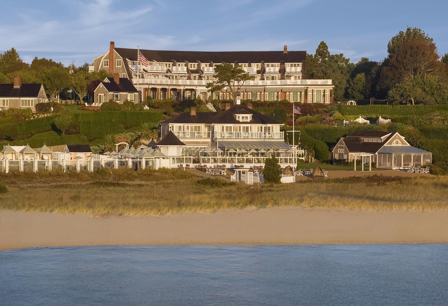 Exterior photo of Chatham Bars Inn main building with beach house restaurant and beach
