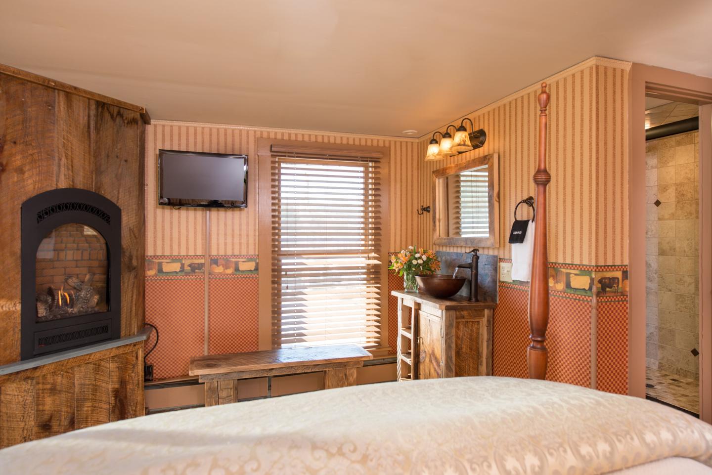 The fireplace and vanity of Cornelia's Room.