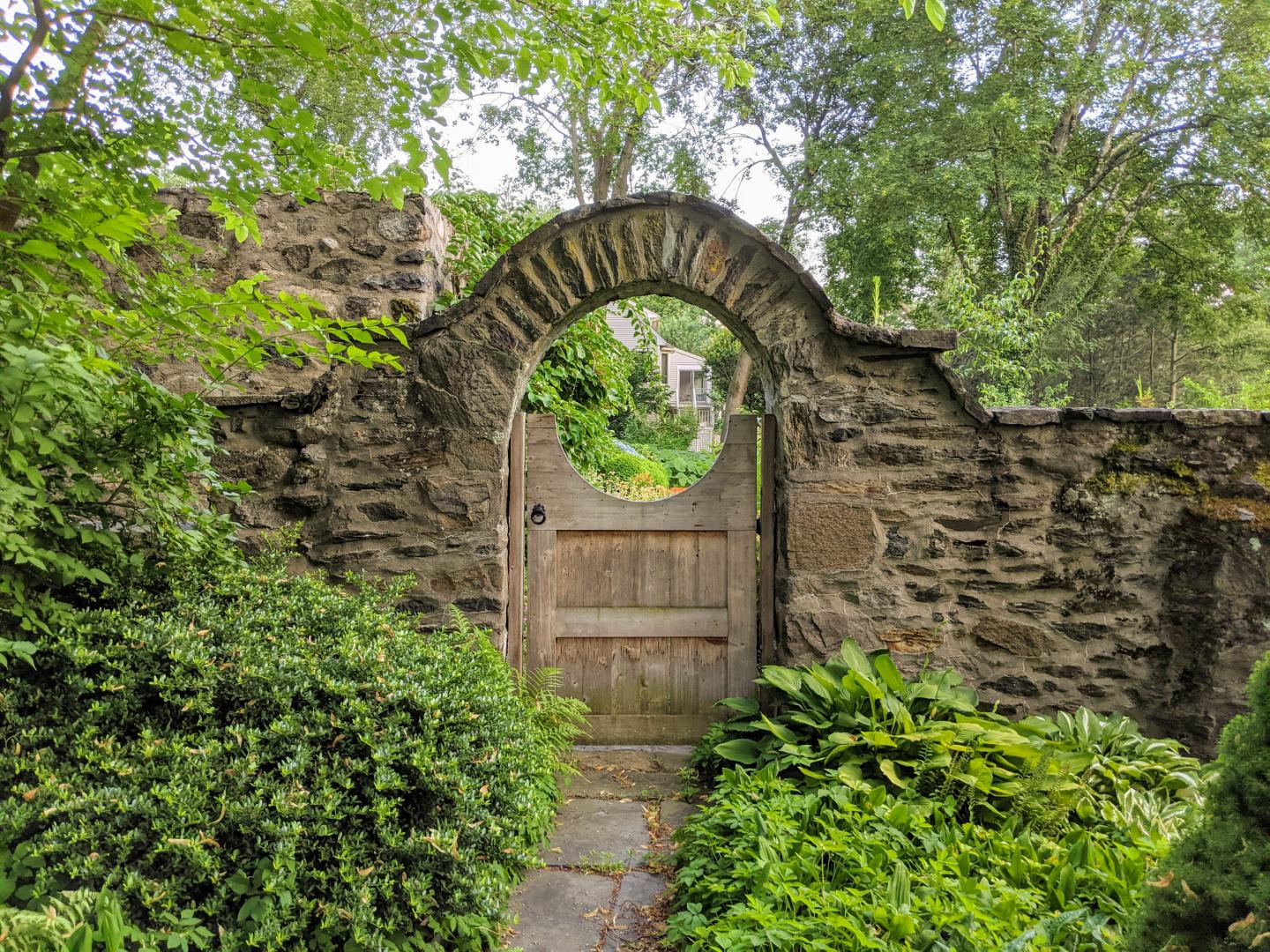 Garden gate in the ruins in the Secret Garden of Stanton House Inn