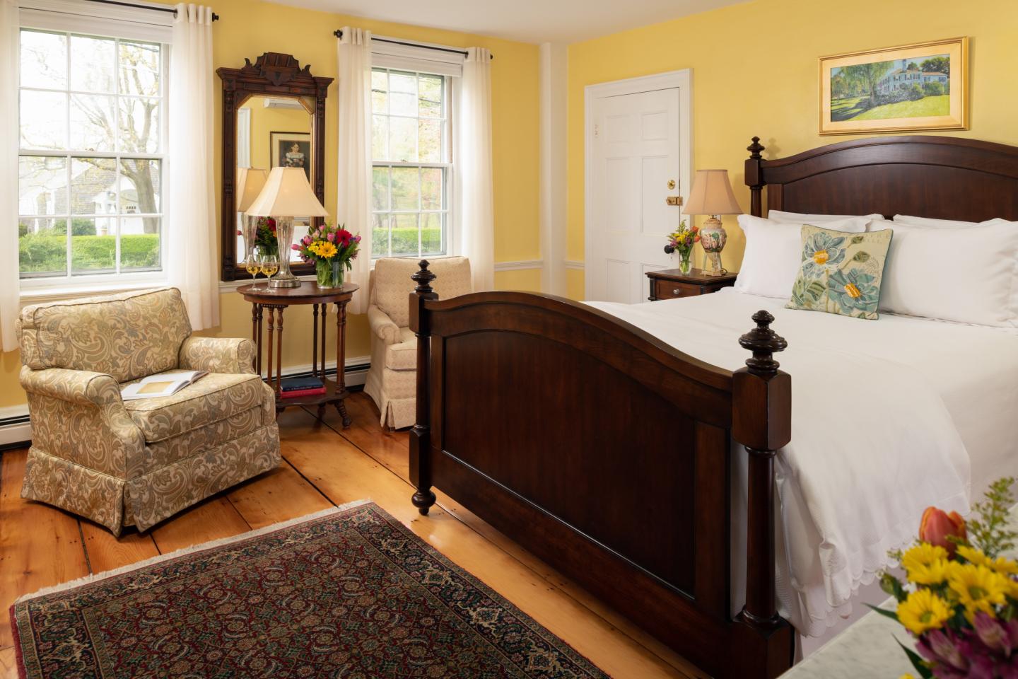 bed and chair in guest room