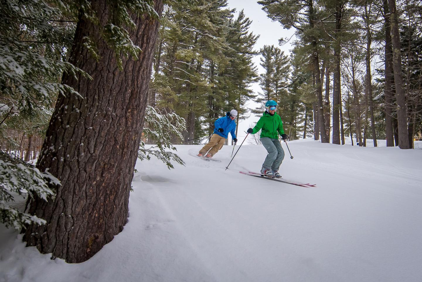 Couple SKing Pine Ski Area at Purity Spring Resort