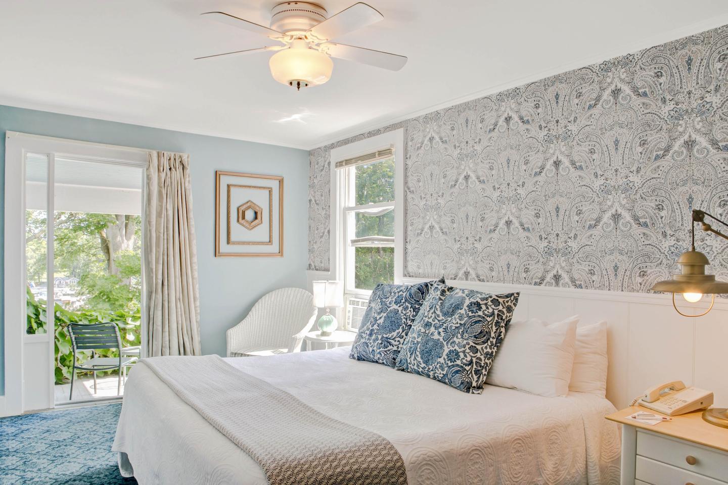Interior of Lodge Room with king size bed and porch