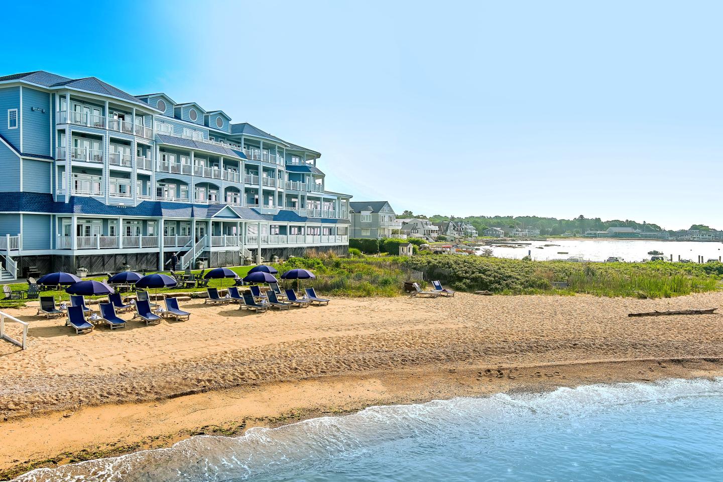 beachfront with chairs and umbrellas overlooking Long Island Sound 
