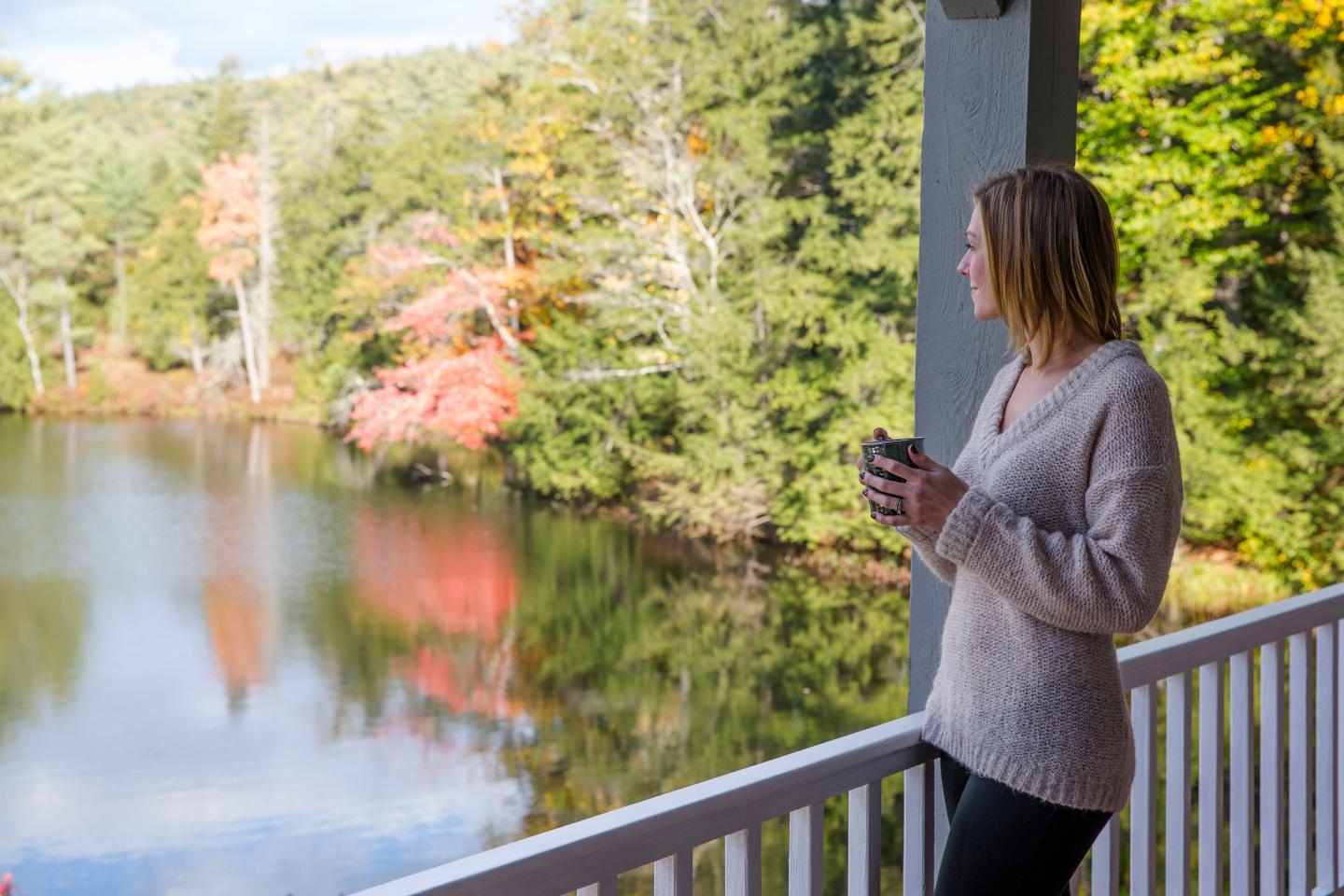 Woman Enjoying Lake View at Purity Spring Resort