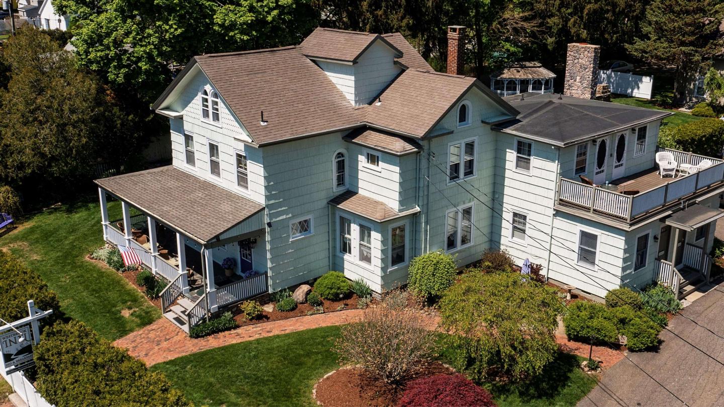 An aerial view of a victorian home.