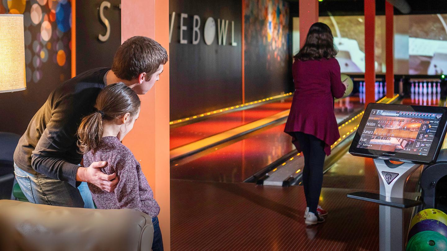 Family having fun bowling at Stowe Bowl
