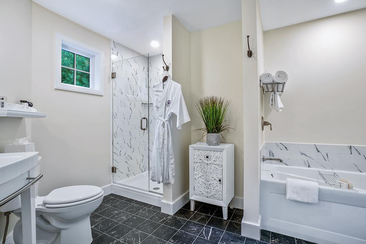 Bathroom with shower and tub