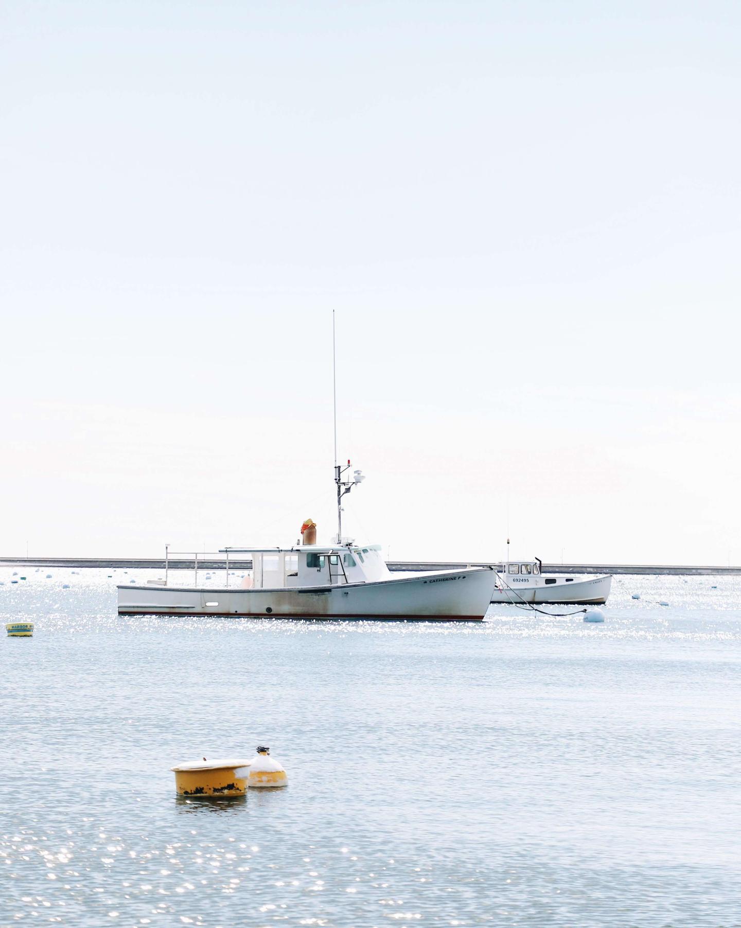 A boat in the water on a beautiful day in Marblehead, MA