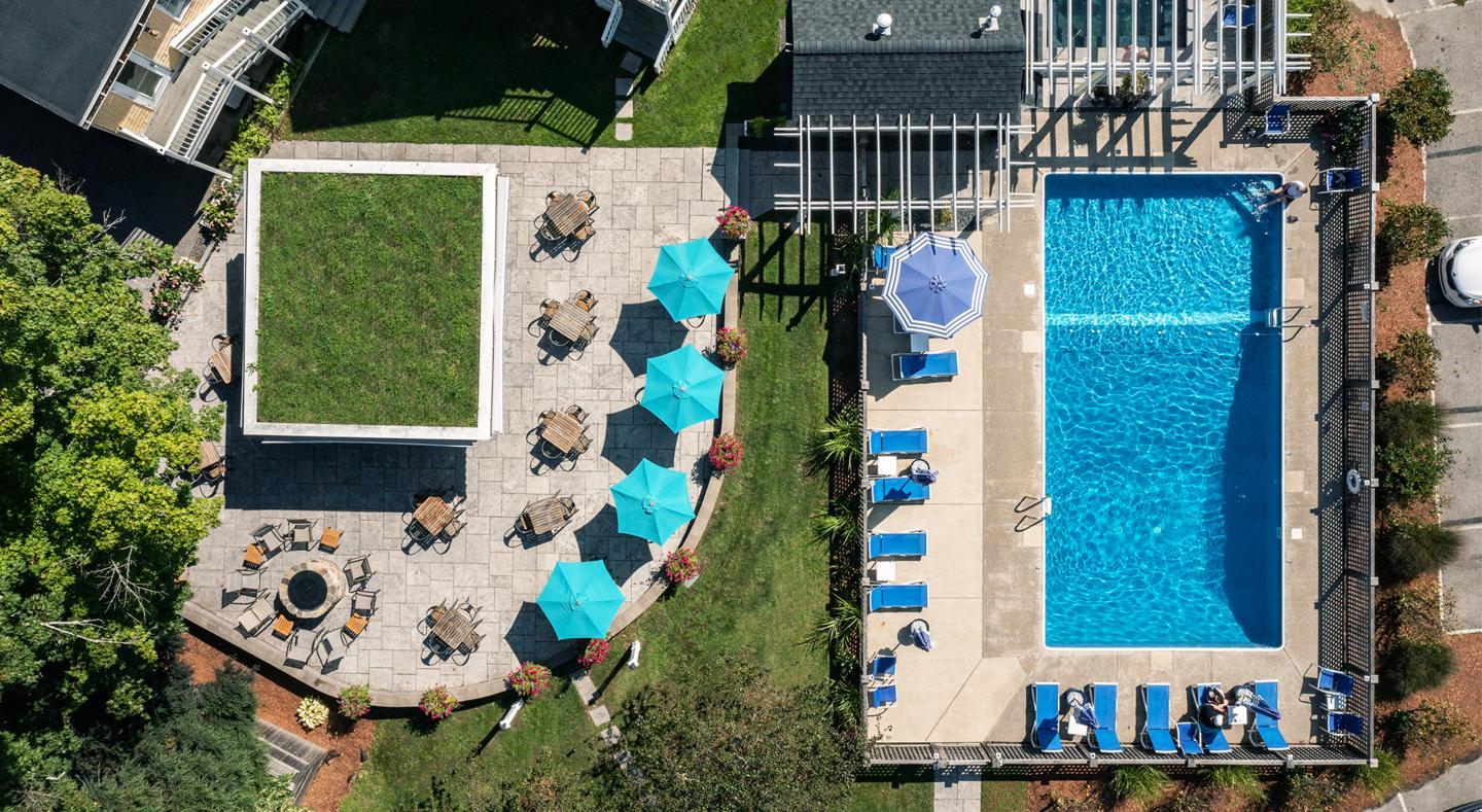 A birds eye view of our family pool and patio bar area