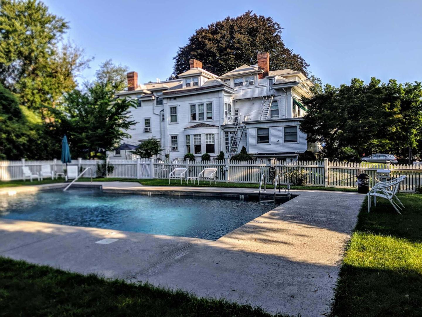Outdoor seasonal pool at our downtown Greenwich, CT, bed and breakfast inn