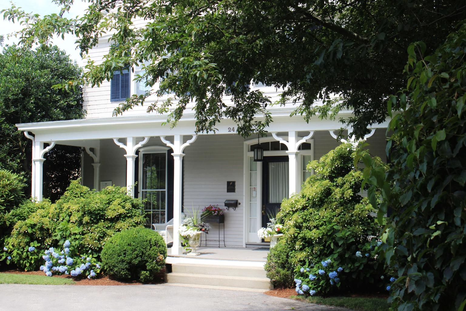 Exterior of La Farge Perry House with Hydrangeas and Trees