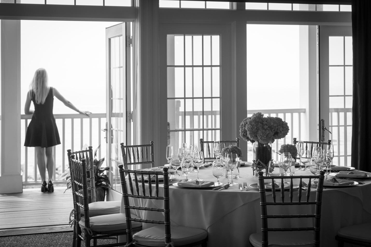 Guest on Balcony outside Ballroom at Madison Beach Hotel