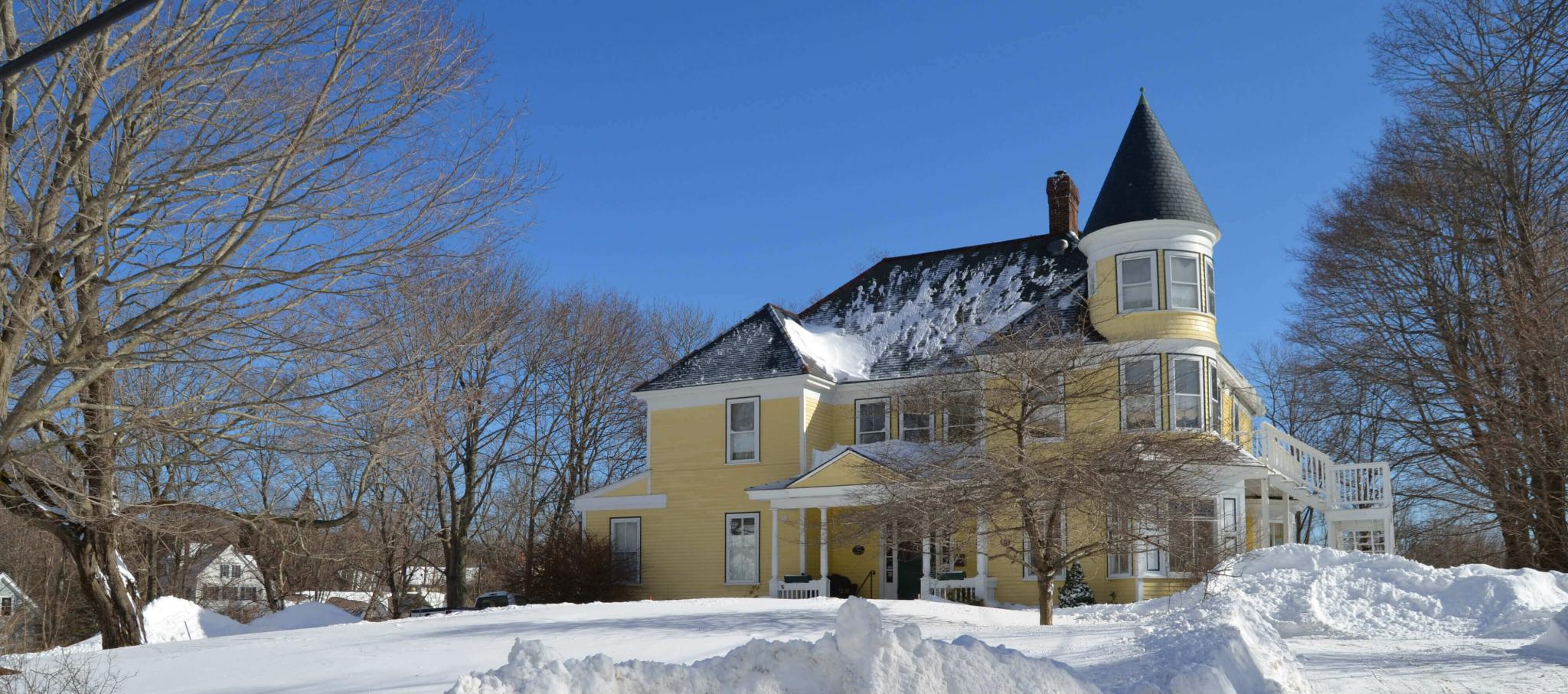 front of Hawthorn Inn with snowcovered ground