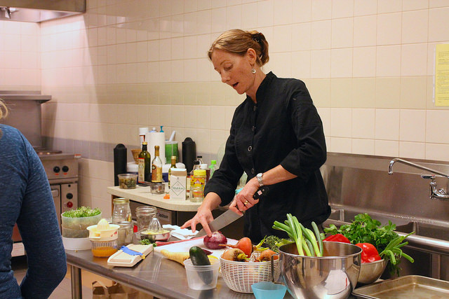 Woman teaching cooking class