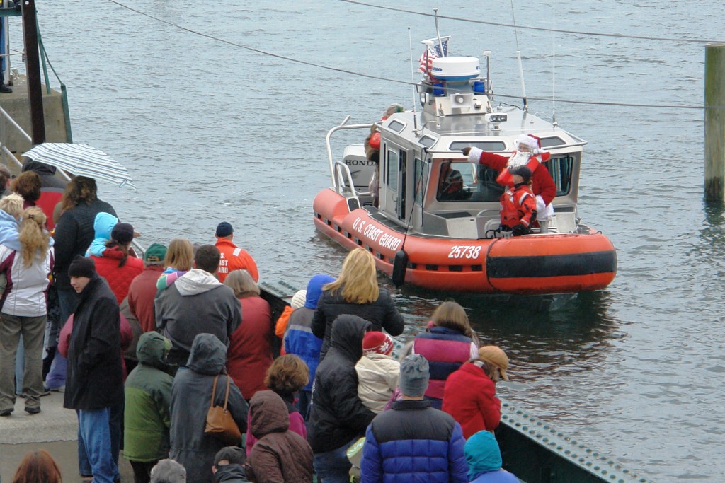 For Christmas in New England, Santa arrives by boat.