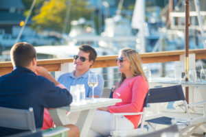 Man and Woman Eating By The Water In Connecticut