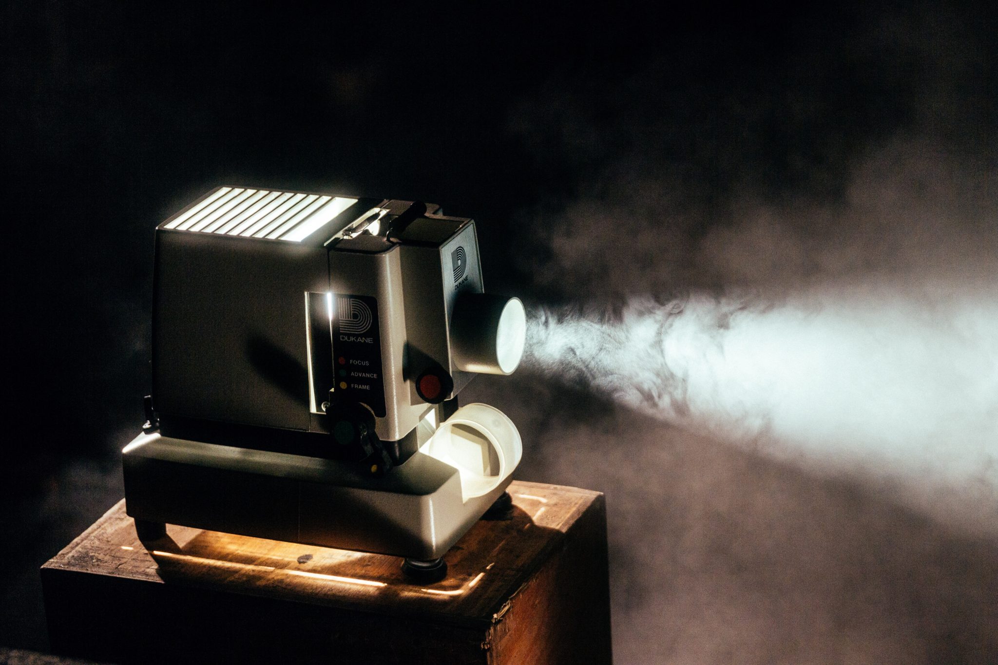 A projector at an outdoor movie venue in New England.